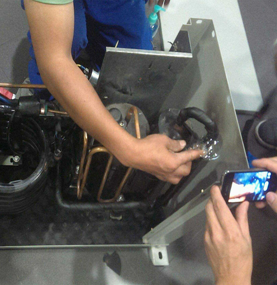 高明维修空调制冷效果差